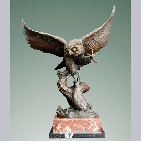 Bronze Owl in Flight